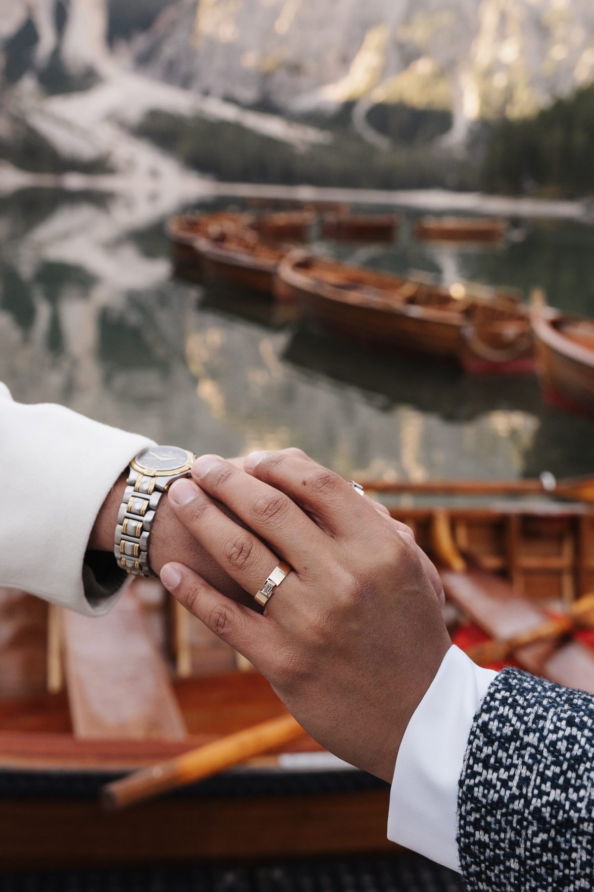 One hand on the other, with ring and watch